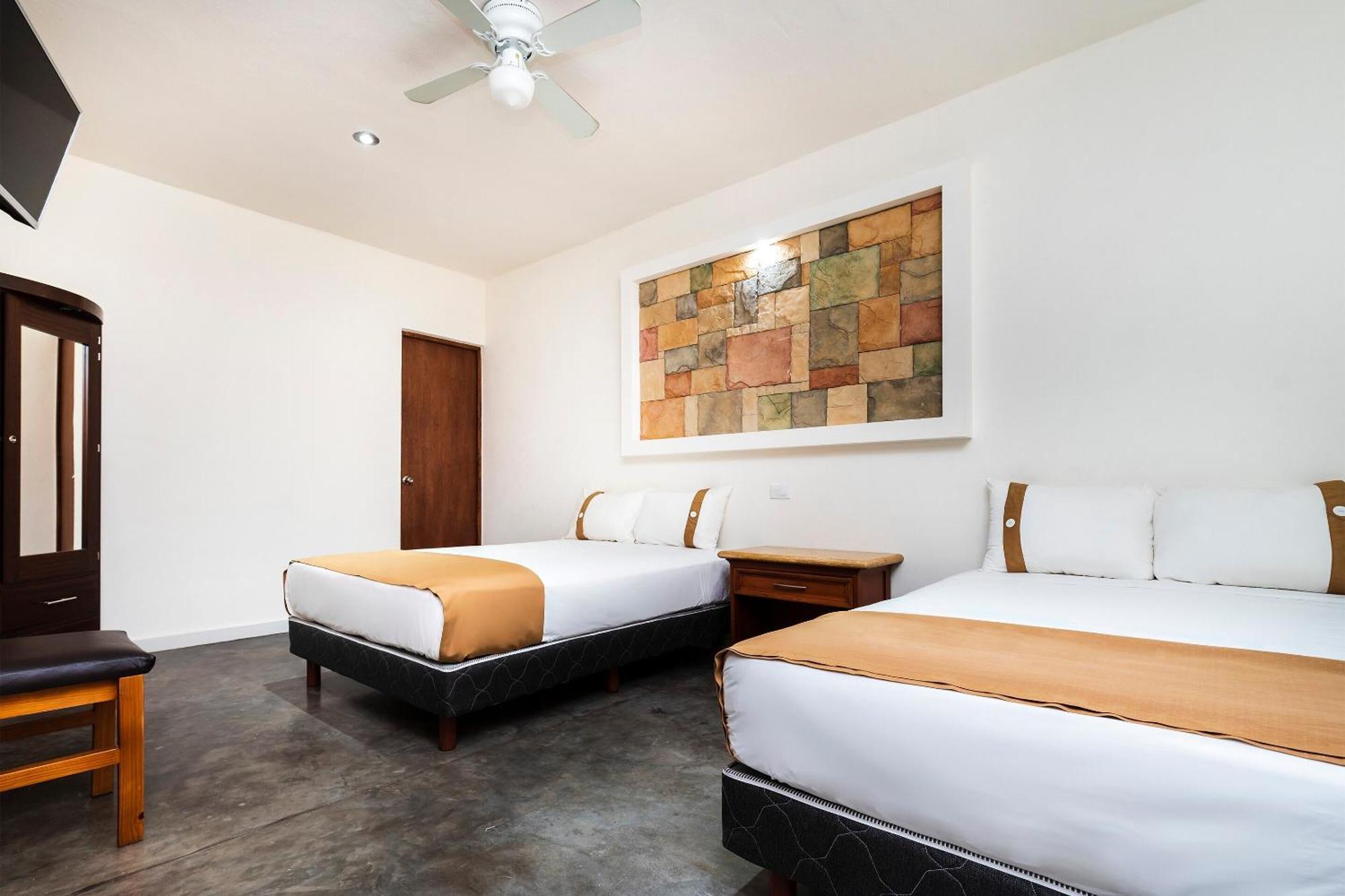 Capital O Hotel Joyma Suites, San Luis San Luis Potosi Exterior photo