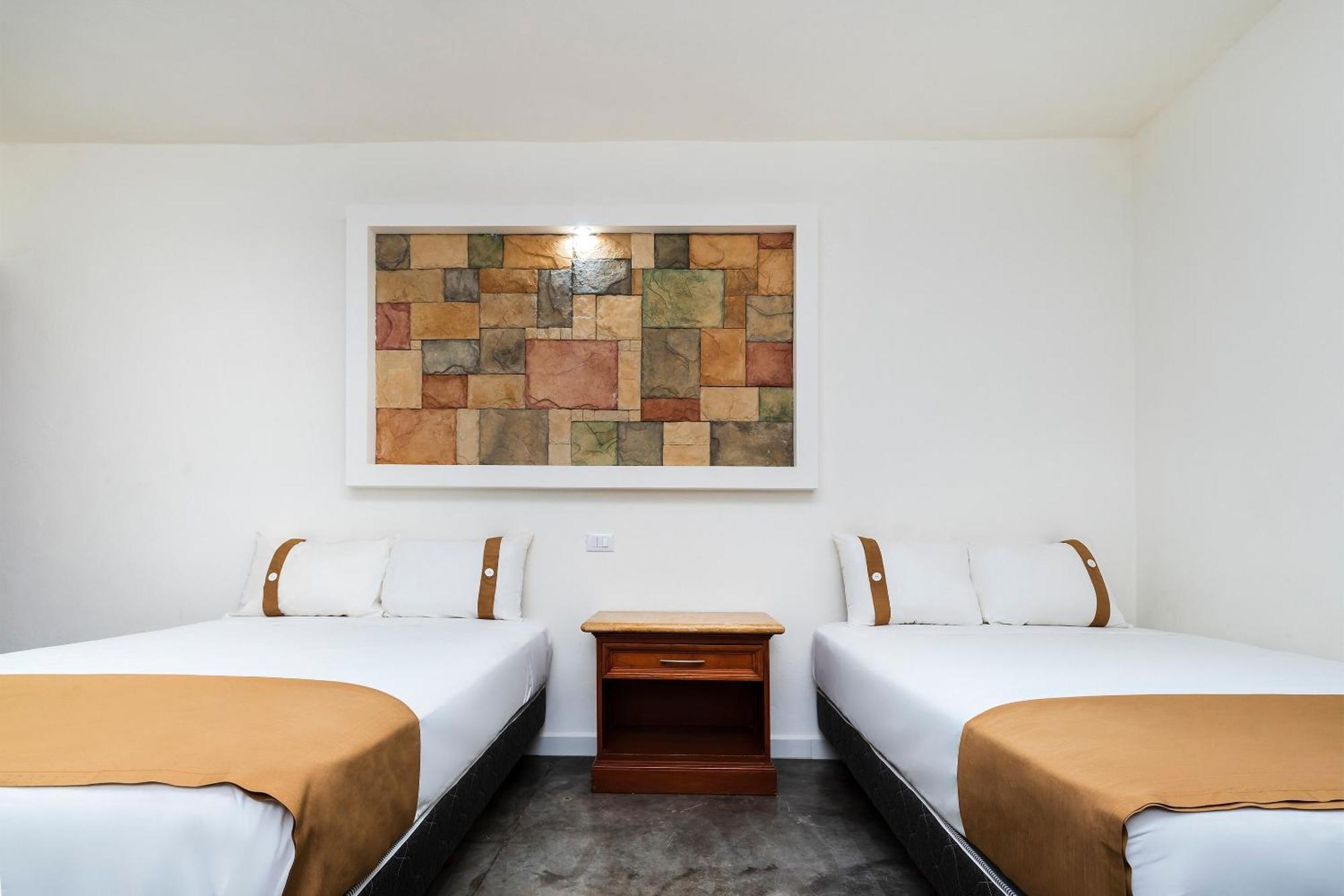 Capital O Hotel Joyma Suites, San Luis San Luis Potosi Exterior photo